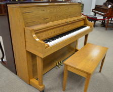 Yamaha P22 studio piano in oak